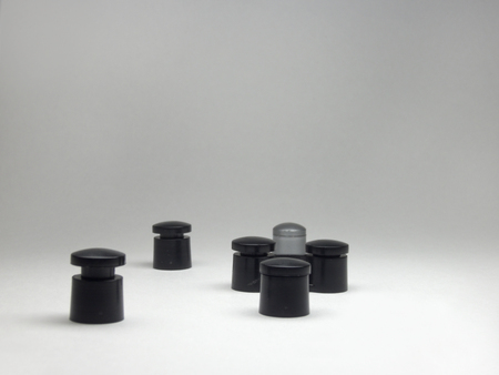 the legs and the stub of racks for disks, intricately laid out on whiteの写真素材