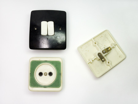 The old switches with sockets for connection and green outletの写真素材