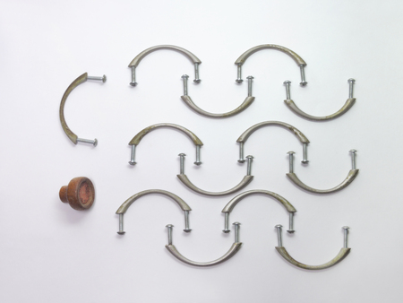 handles for furniture: slim metal and old woodenの写真素材