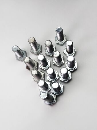 crumbling compound figured shape. Pattern composed of the steel boltsの写真素材