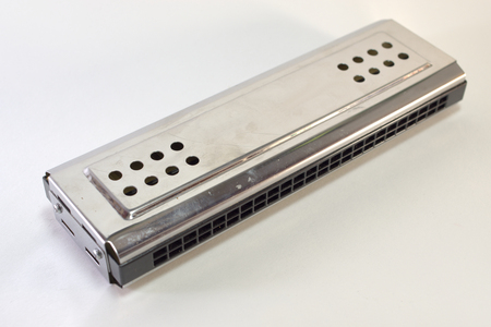 diatonic tremolo harmonica. Metal, chromed, Close-upの写真素材