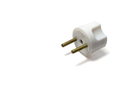 electric plug for European outlet. Non integrated and replaceable connector. spare part of power cord, white color, two sticks-plated pins, isolated on white background, with clipping pathの写真素材