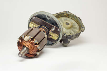 car windshield wipers motor disassembled. carbon brushes holder assembly with collector, armature with copper wire loops. selective focusの写真素材