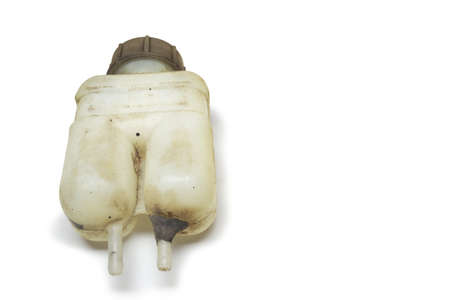brake fluid tank of master cylinder, dual chamber, semitransparent, screw-on level sensor cap. on white background, with clipping pathの写真素材