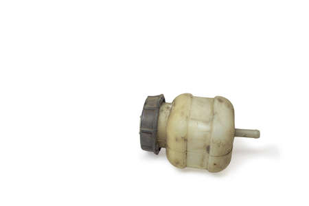 clutch master cylinder reservoir, plastic, pale white, gray cap. on white background, with clipping pathの写真素材