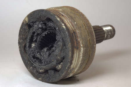 constant velocity joint of front wheel drive car, dismantlet for replacing, dirty, worn. with clipping pathの写真素材