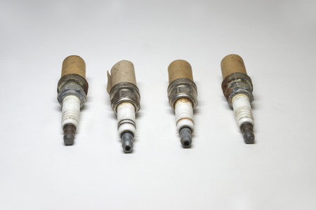spark plug set, worn, corrosion, used, in cardboard packaging of threadの写真素材