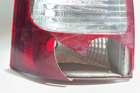 tail light of station wagon body car. closeup ob broken plastic lensの写真素材
