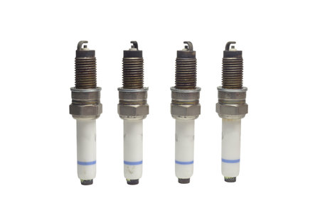 spark plugs kit, old, isolated on white background