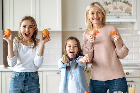 Three female generation spend time together at the kitchen at home. Caucasian happy grandma daughter...