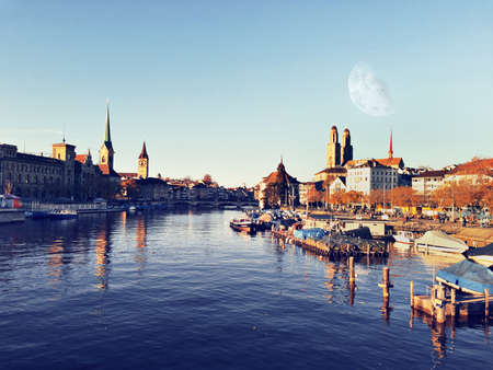 Swiss lake with buildings and moonのeditorial素材