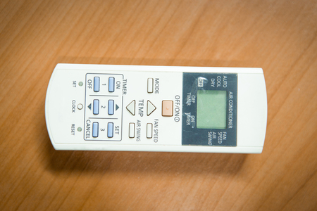 remote air condition on the tableの写真素材