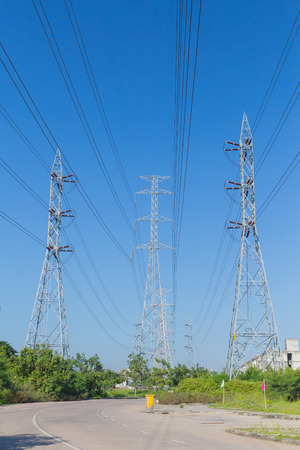 A long line High voltage power towersの写真素材