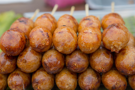 fried sausages on backgroundの写真素材