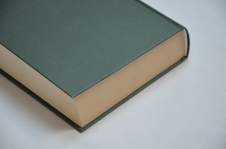 Detail of Green Book on the grey backgroundの写真素材