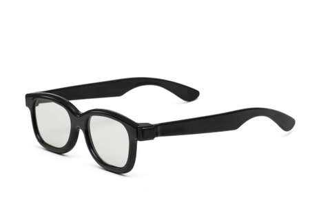 Black plastic glasses to watch films in 3D format isolated close up on white backgroundの写真素材