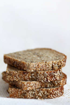 Slices of brown bread with seedsの写真素材