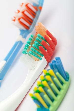 three toothbrush on whiteの写真素材