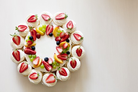 Berry fruit cottage cheese cake on a white backgroundの写真素材