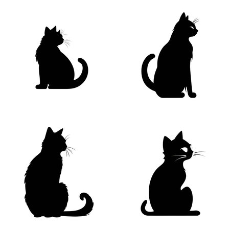 Vector illustration of cats in black silhouette against a clean white background, capturing graceful forms.のイラスト素材