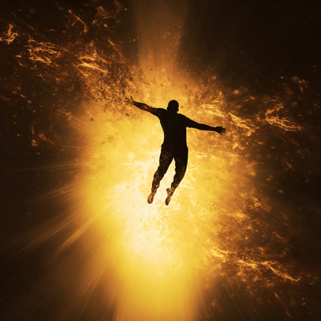 Black silhouette of a man rising against yellow rays of light.Silhouette concept, tattoo artist.の写真素材