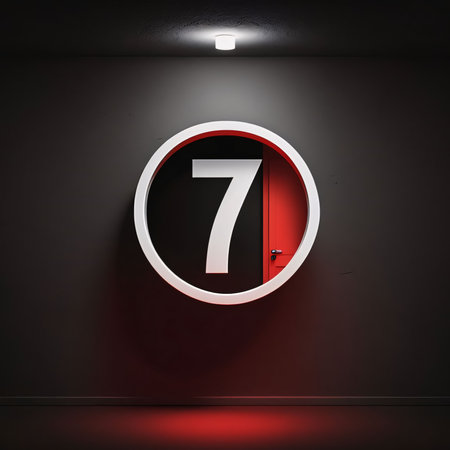 Graphic numbers: number seven on the wall illuminated by a red light from the ceilingの写真素材