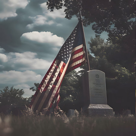 A close-up of an American flag waving in the wind at a grave in a cemetery.