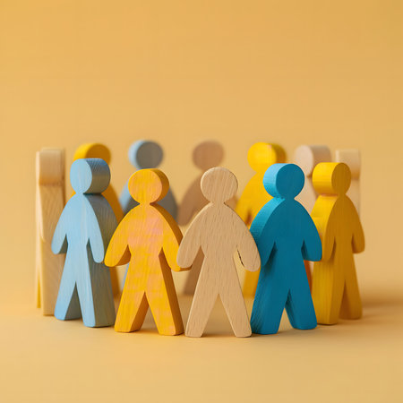 A circle of colorful wooden human figures, representing unity, diversity, and teamwork.の写真素材