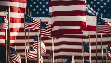 A close-up of several American flags waving in the wind.の写真素材