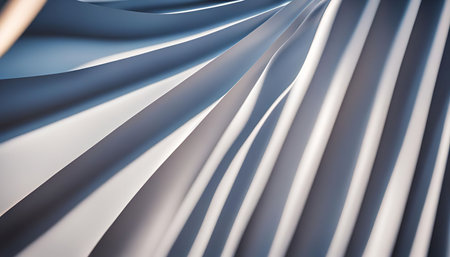 Abstract photograph of a smooth, white fabric with folds and creases, creating a unique textured background.の写真素材