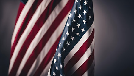 A close-up shot of an American flag with folds and wrinkles, highlighting the red, white, and blue...