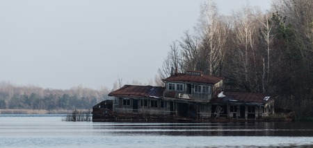 Sunken building in waterの写真素材