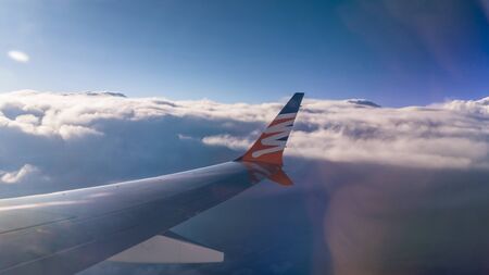 View from airplane window to see sky on evening time.