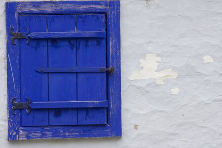 Blue Window on Wallの写真素材