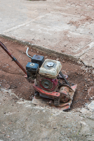 Workers on asphalting and repair of city streets