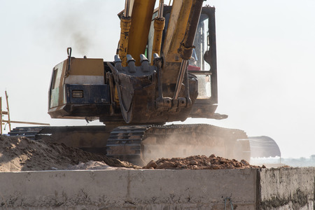 Production equipment for excavators on modern construction sitesの写真素材