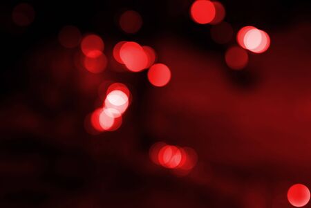 Defocused abstract red lights background, Christmas background.