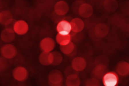 Defocused abstract red lights background, Christmas background.の写真素材