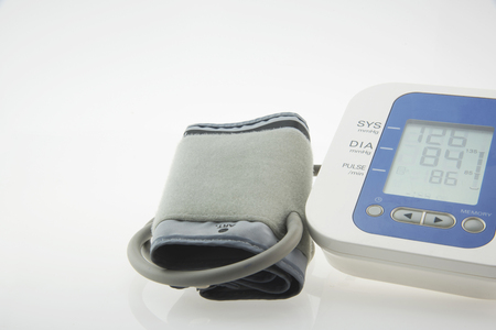 Digital Blood Pressure Monitor on white backgroundの写真素材
