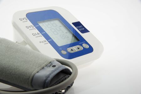 Digital Blood Pressure Monitor on white backgroundの写真素材