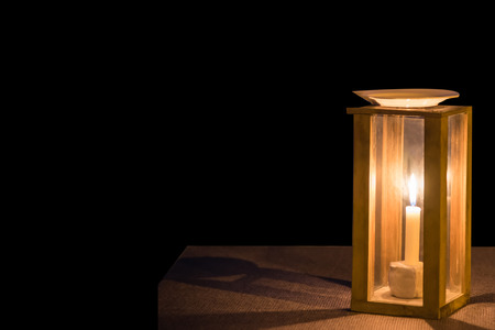 Candle light for dinner isolated on blackの写真素材