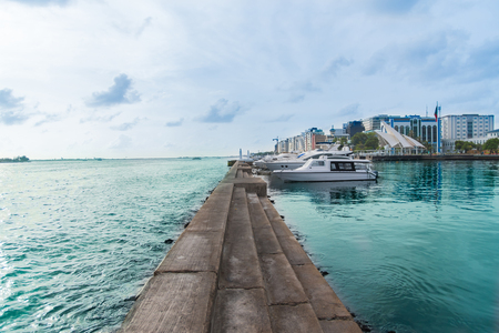 Speed boats in the harbor in city Male, capital of Maldivesの写真素材