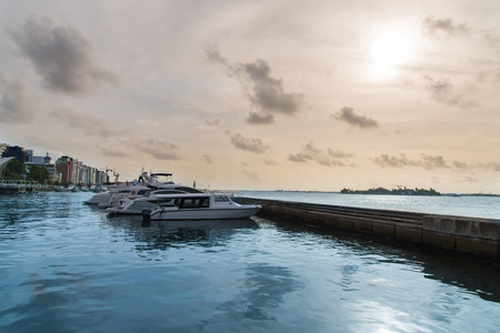 Speed boats in the harbor in city Male, capital of Maldivesの写真素材