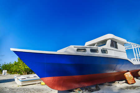Repair and restoration of old wooden boat at Maafushi island,Maldivesの写真素材