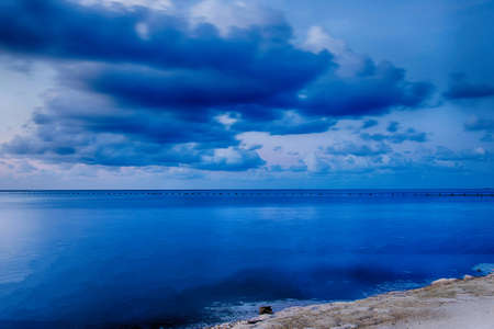 Motion of Blue sea and sky with clouds in Maldivesの写真素材