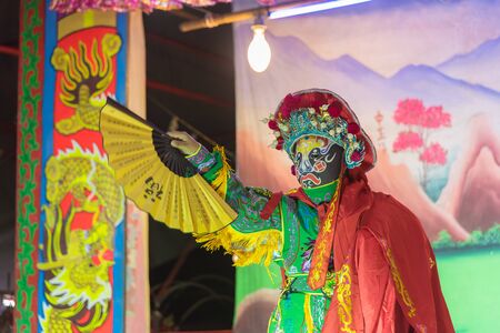 Kalasin, Thailand - December 9, 2017: Actor make up for the performance Chinese opera. Chinese opera is an ancient musical drama at Somdet district Kalasin, Thailand.のeditorial素材