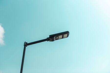 Solar cell smart street lamp with blue sky background in day time,Street light in park,Lamp park.
