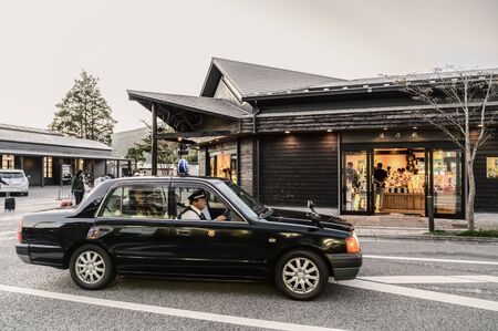 Yufuin, JAPAN - 14 October 2019 : Tourists travel around Yufuin, the touristic landmark on Kyushu Island in South of Japan.のeditorial素材