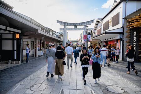 Fukuoka, JAPAN - 15 October 2019 : Tourists coming to pay respect at Dazaifu Tenmangu Shrine, one of the most well-known Shinto shrines in Japan.のeditorial素材