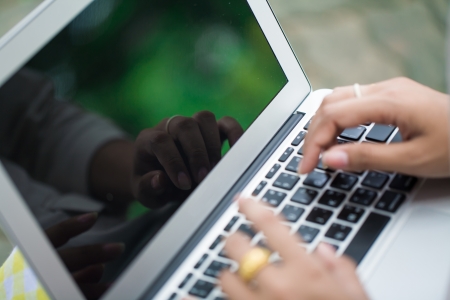 typing on laptop, women fingerの写真素材